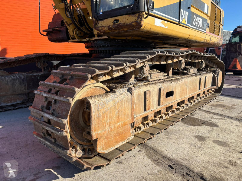 Rýpadlo Caterpillar AC