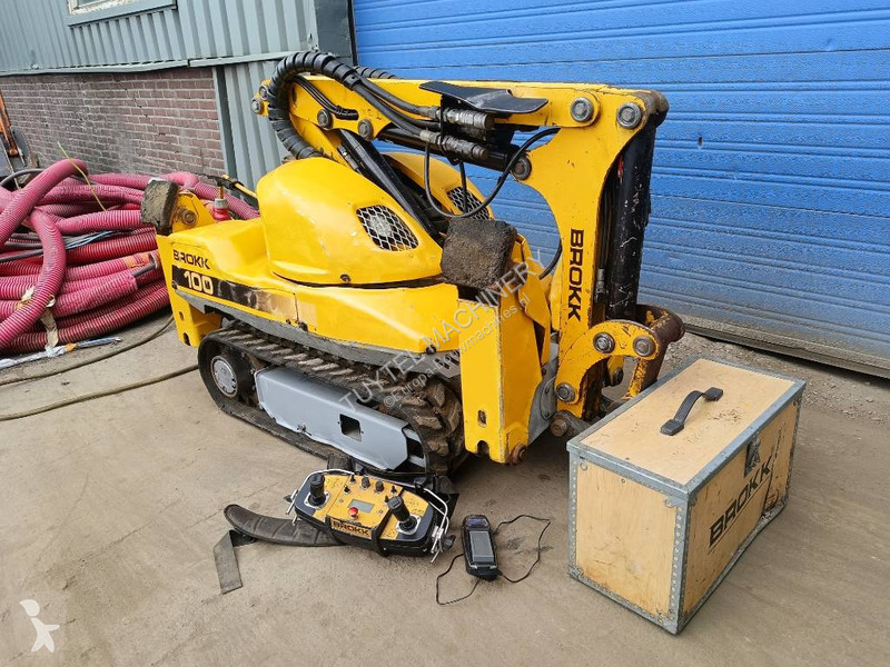 Lopatový nakládač Brokk 100 husqvarna robot...