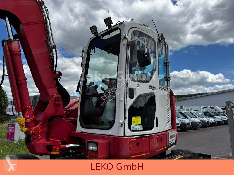 Rýpadlo Komatsu PW118MR-8 Mit Drei Löffeln