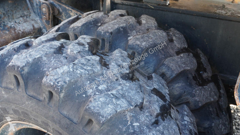 جرافة Komatsu Mobilbagger Verstellausleger HS21