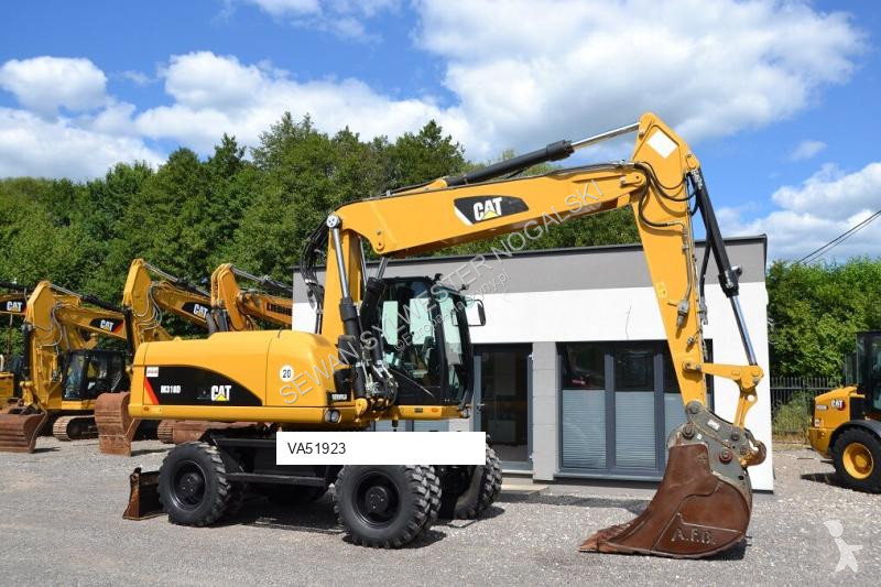 Lopatový nakládač Caterpillar 318 D