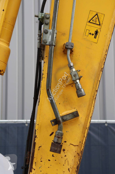 Багер New Holland Kobelco 2