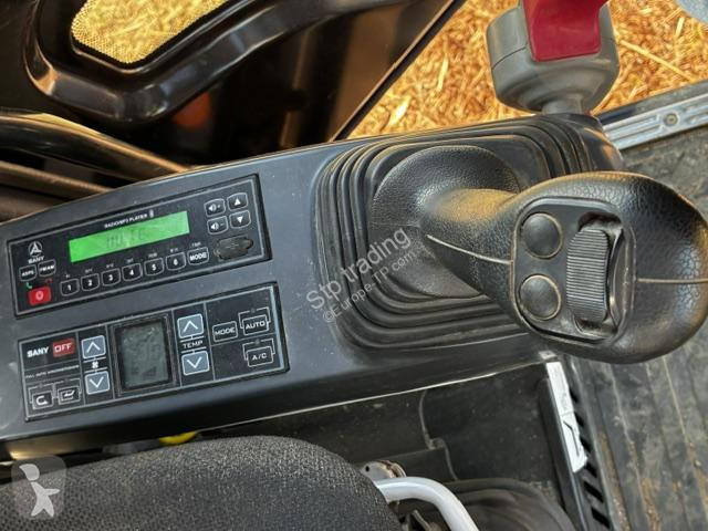 Екскаватор Sany 135U