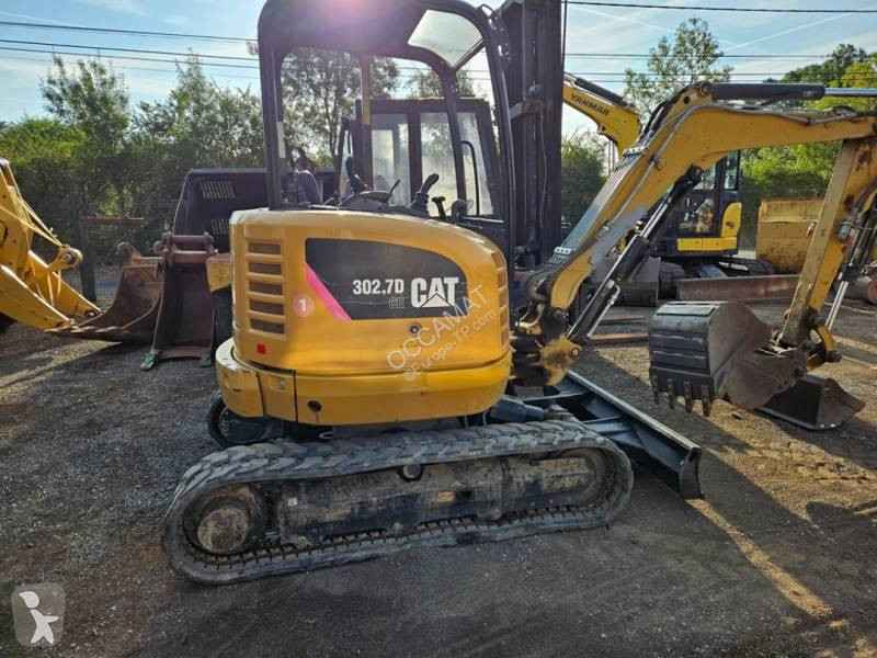 Екскаватор Caterpillar