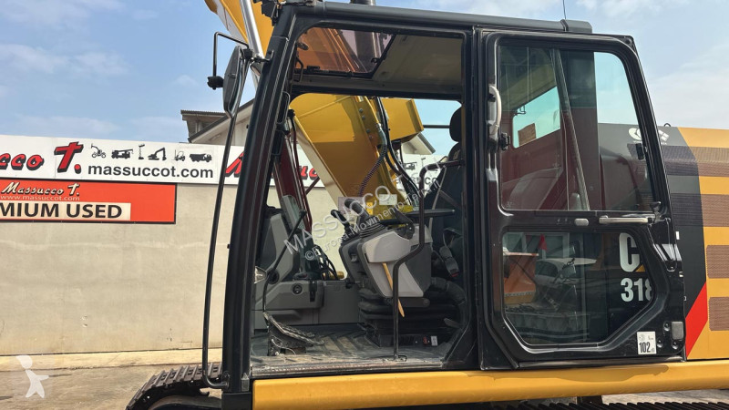 Багер Caterpillar 318FL