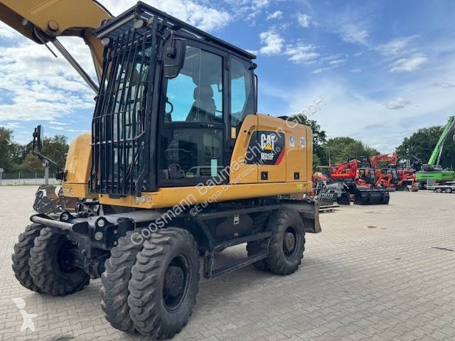 Багер Caterpillar F