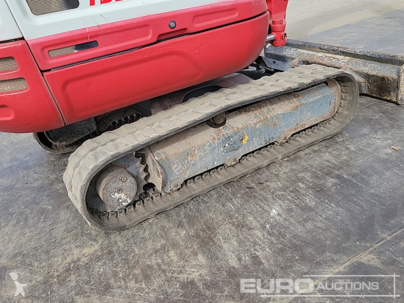 Escavadora Takeuchi 0