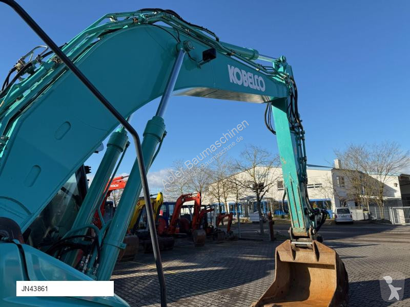 Excavadora Kobelco SK210 NLC-10 OQ70 180 Grad...