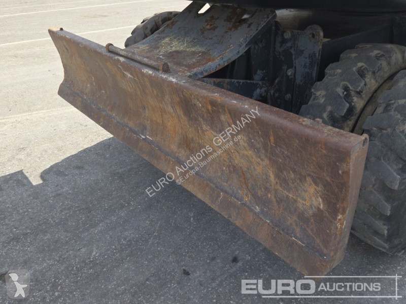 Багер Komatsu