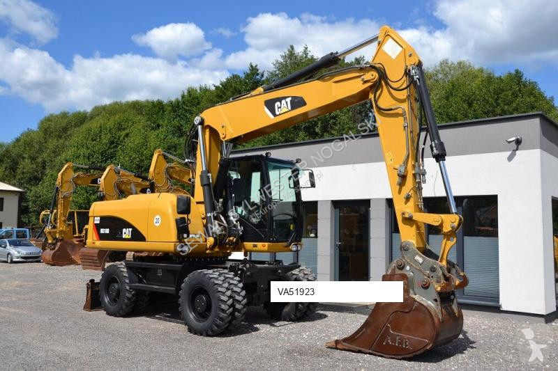 Lopatový nakládač Caterpillar 318 D