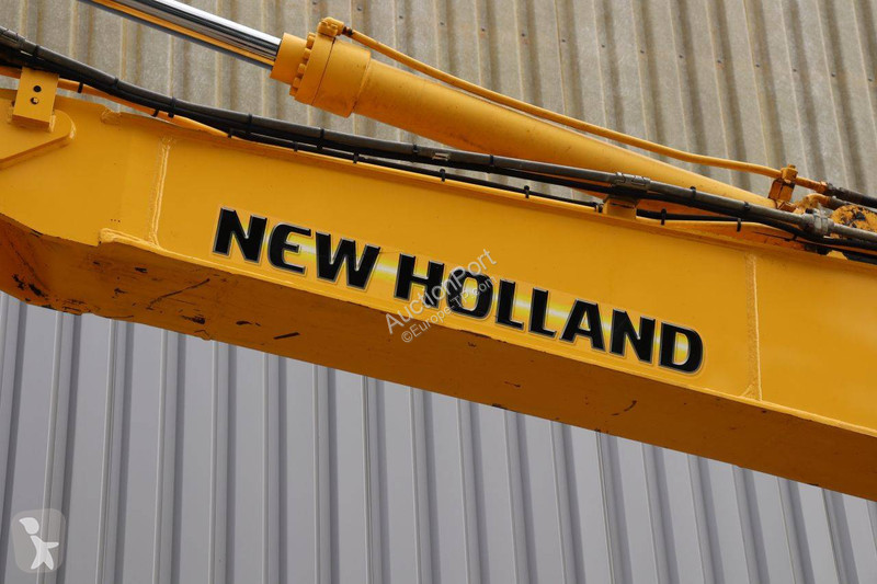 Багер New Holland Kobelco 2