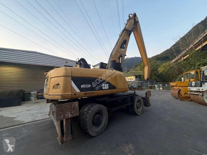 Skovel Caterpillar DMH