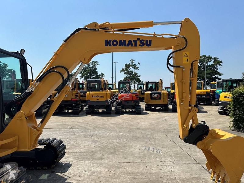 Екскаватор Komatsu 7