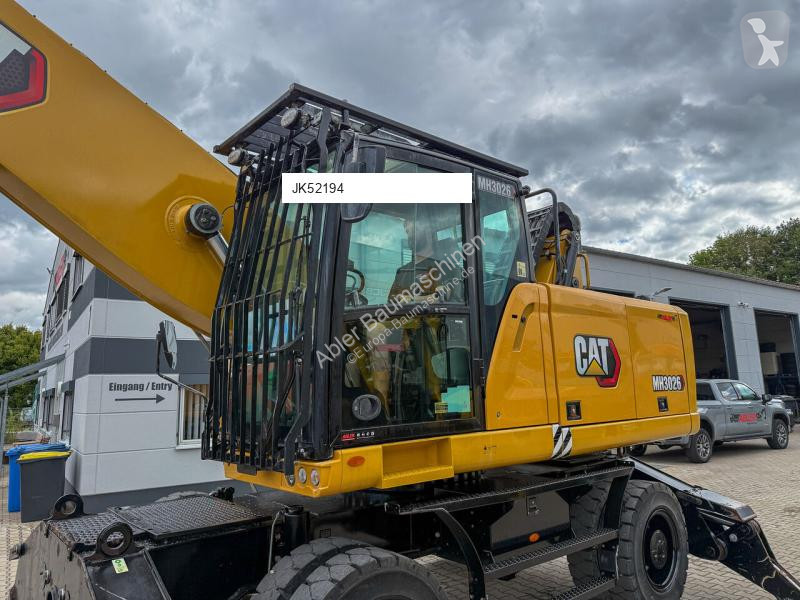 Екскаватор Caterpillar MH3026-06C...