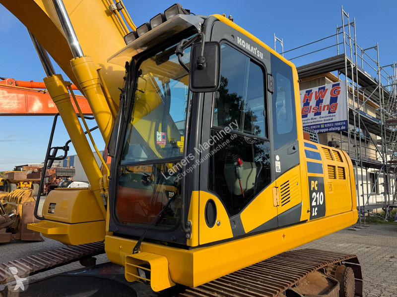 Багер Komatsu PC 210-11 .