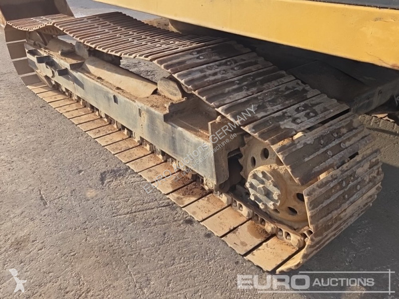 Багер Caterpillar 215C
