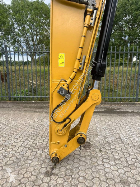 Rýpadlo Caterpillar 325 with dozerblade 1085...