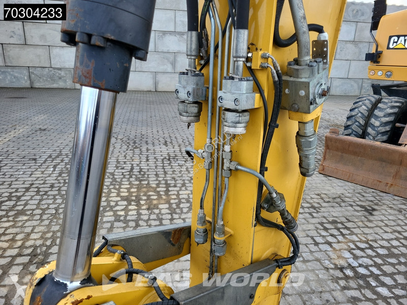 جرافة Caterpillar F F Outrigger + Blade