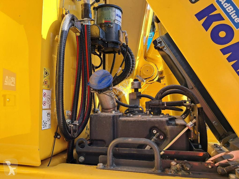Багер Komatsu 11E0
