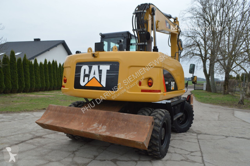 Lopatový nakládač Caterpillar 313