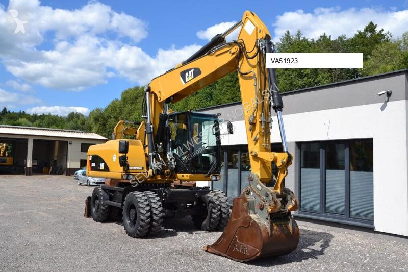 Lopatový nakládač Caterpillar 318 D