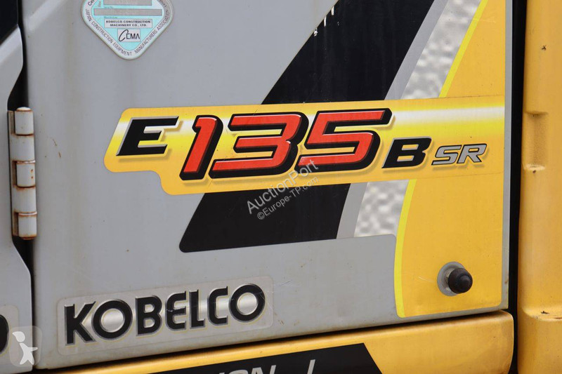 Багер New Holland Kobelco 2