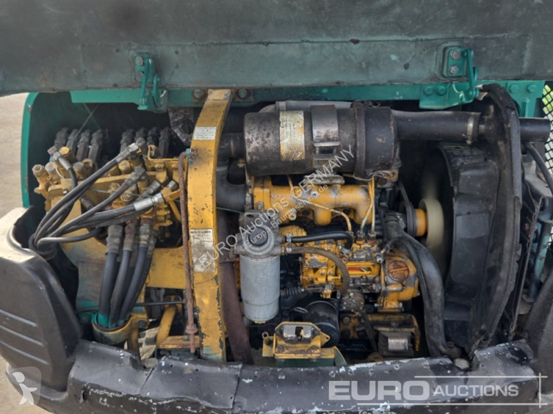 Багер Komatsu PC25-1