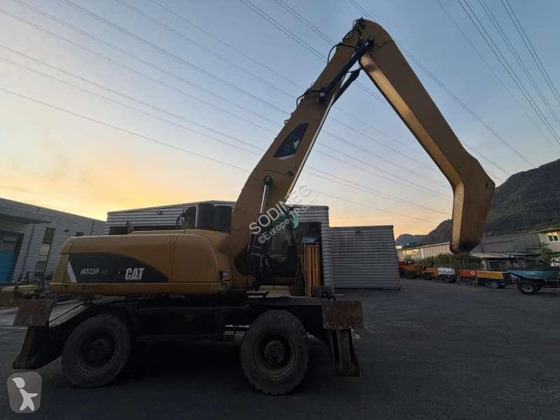 Skovel Caterpillar DMH