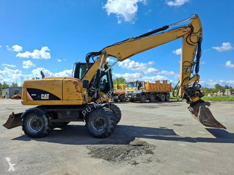 جرافة Caterpillar M 313 D 315
