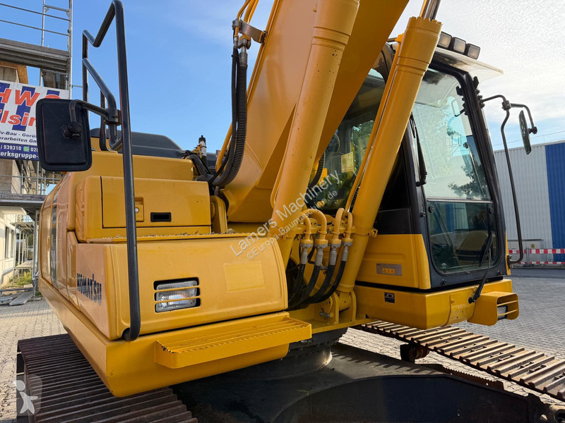 Багер Komatsu PC 210-11 .