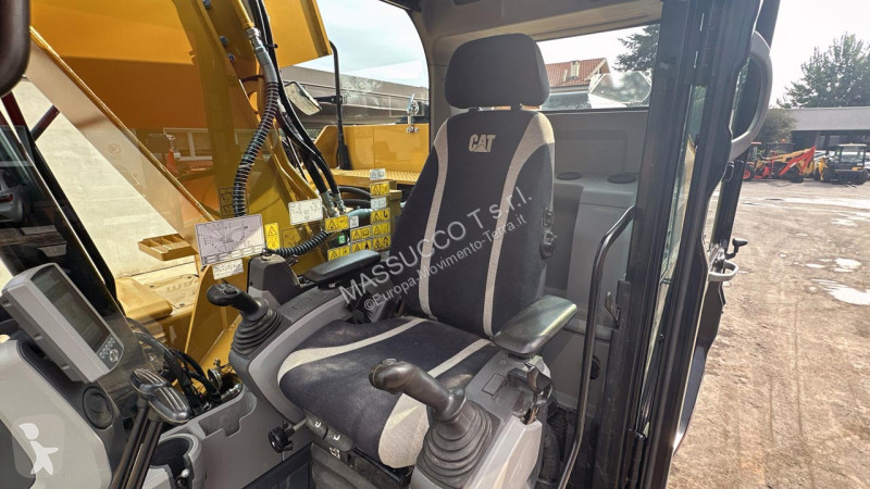 Багер Caterpillar 318FL