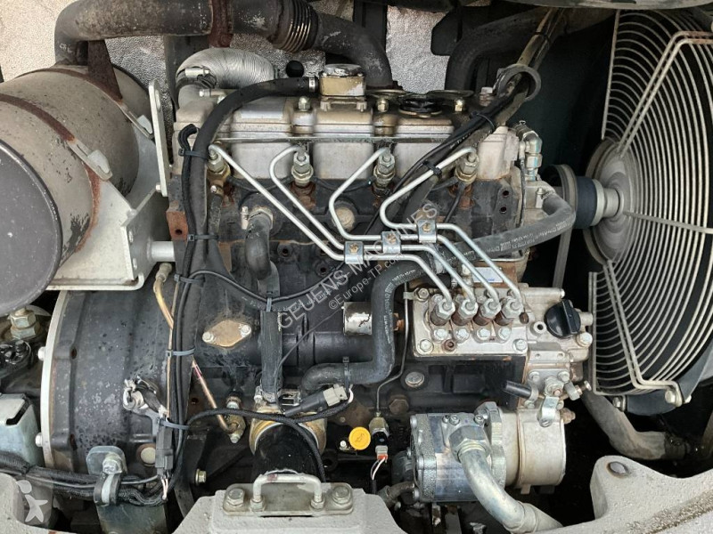 Багер Neuson EW 65