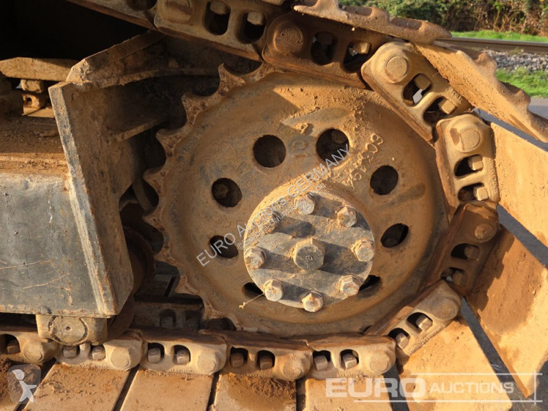 Багер Caterpillar 215C