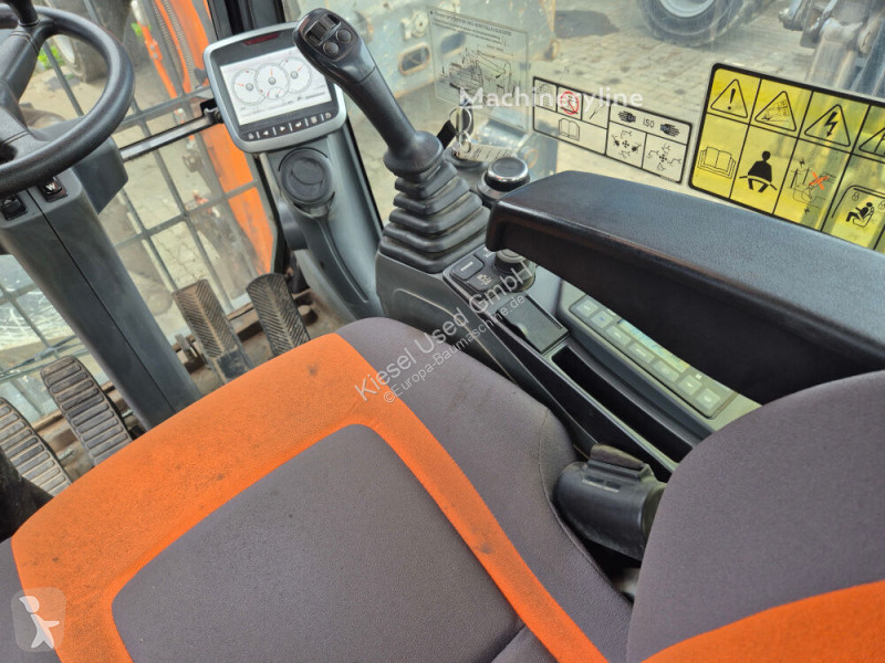 Багер Doosan 5