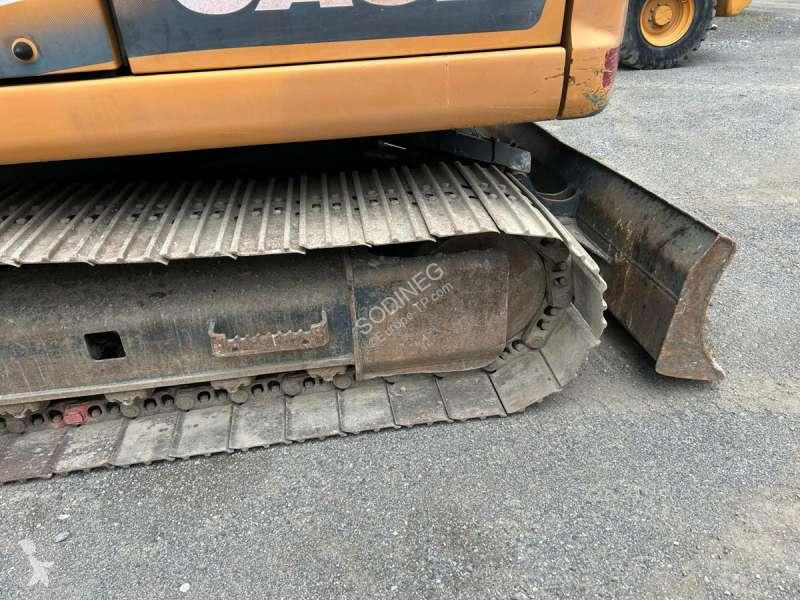 Escavadora Case