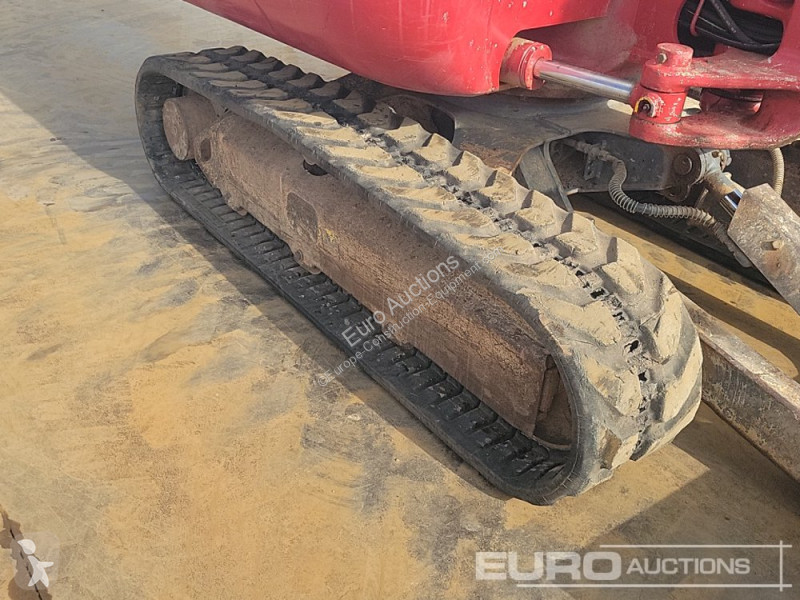 Escavadora Takeuchi 0