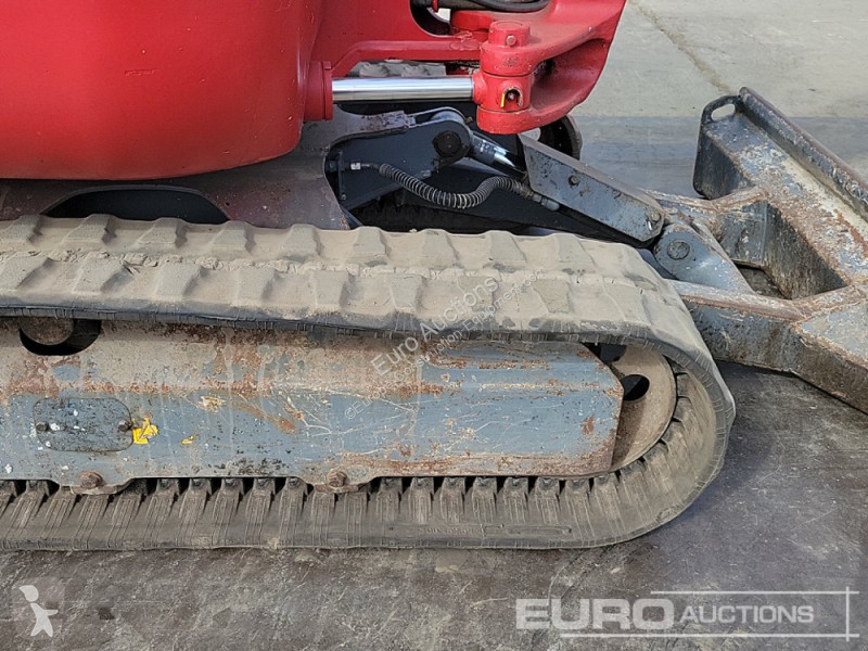 Escavadora Takeuchi 0