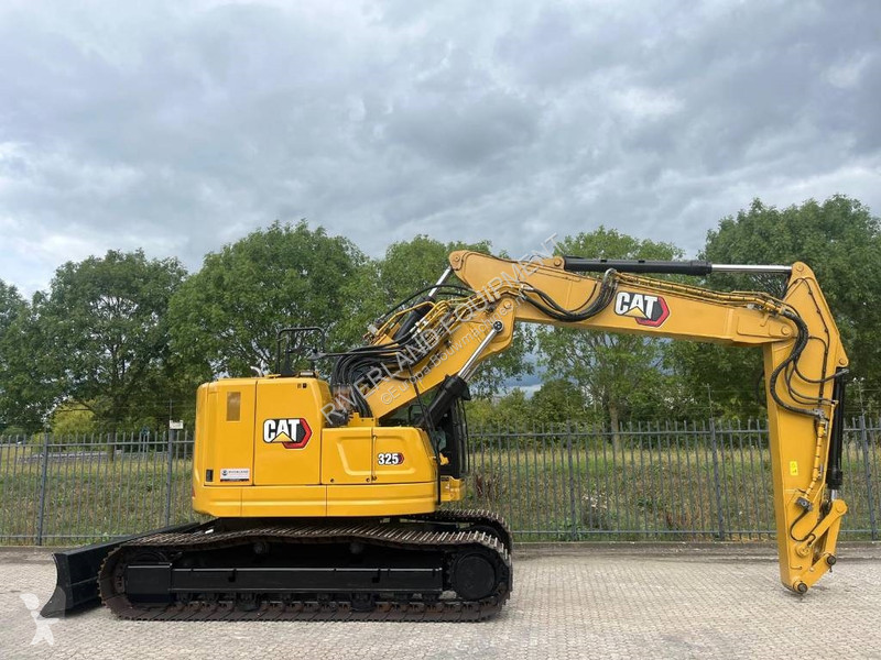 Rýpadlo Caterpillar 325 with dozerblade 1085...