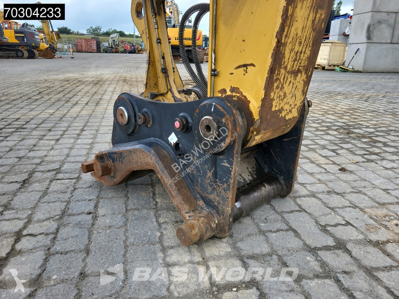 جرافة Caterpillar F F Outrigger + Blade
