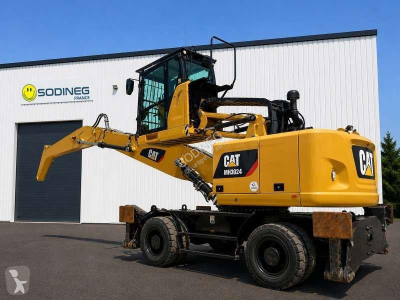 Экскаватор Caterpillar MH4