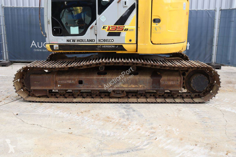 Багер New Holland Kobelco 2