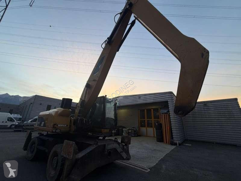 Skovel Caterpillar DMH