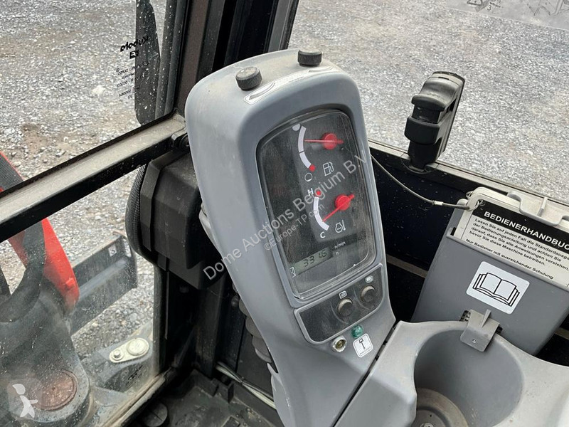 Багер Kubota HI