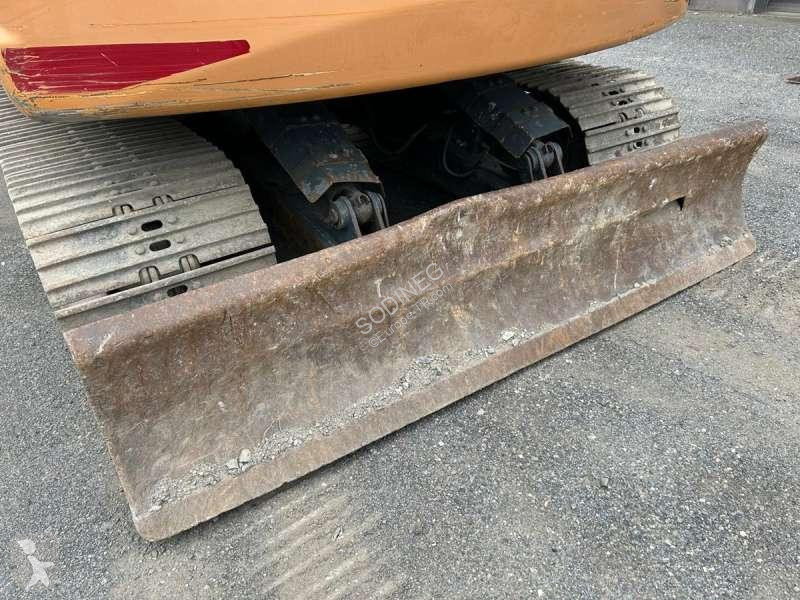 Escavadora Case