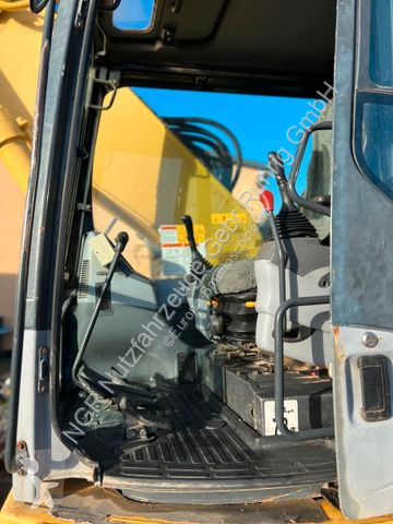 Rýpadlo Komatsu 23200 Kg 107 Kw