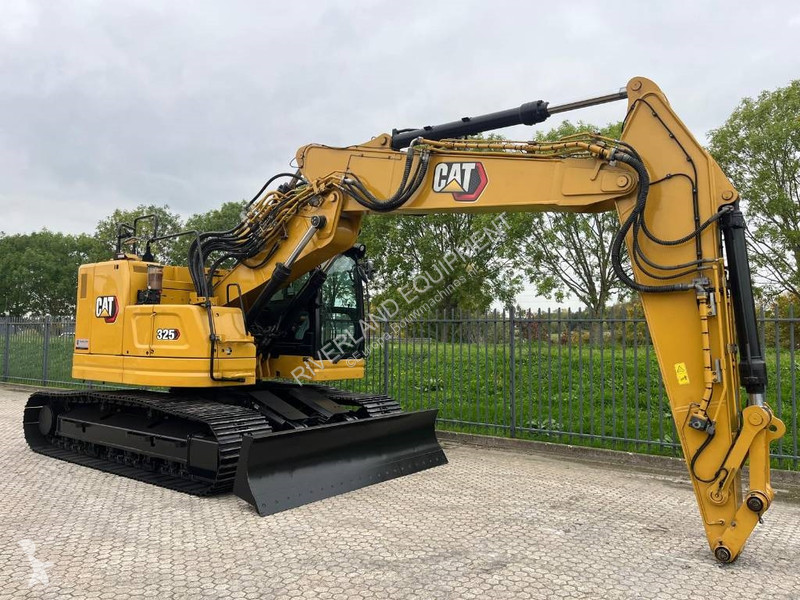 Rýpadlo Caterpillar 325 with dozerblade 1085...