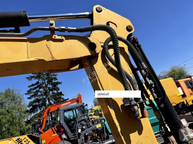 Lopatový nakládač Caterpillar CAT 304C