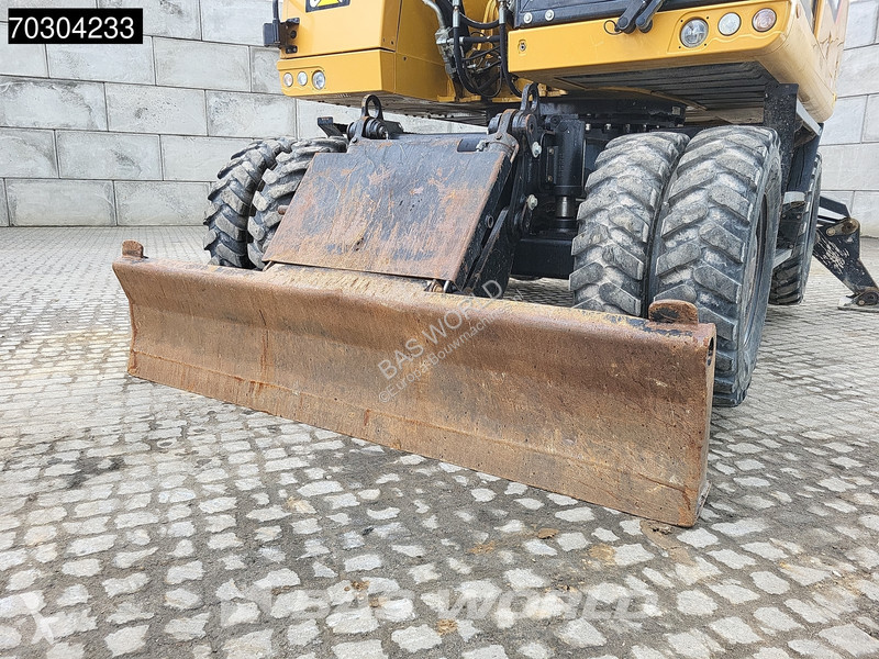 جرافة Caterpillar F F Outrigger + Blade