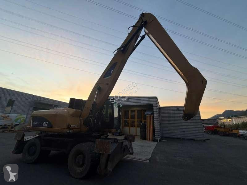 Skovel Caterpillar DMH