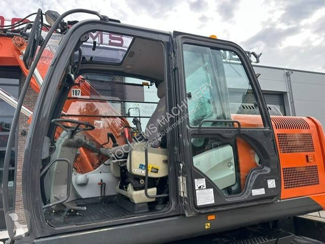 Pelle Hitachi 140 W-5
